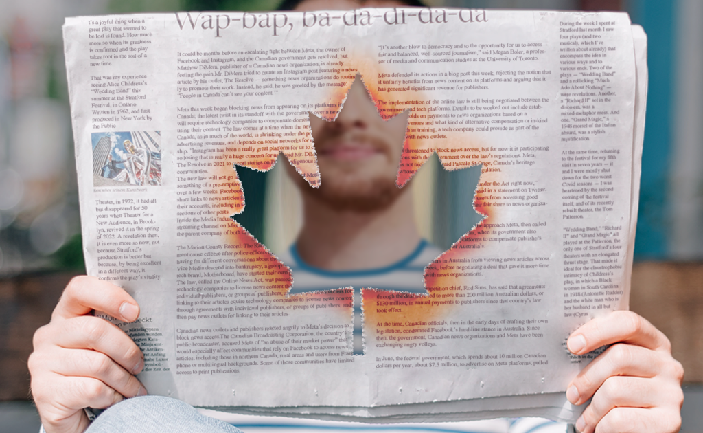 A person holds up a newspaper with hands on either side. The newspaper has a maple leaf-shaped hole with burn marks around it. Through the hole, a blurred face of a white man with a beard is partially visible.